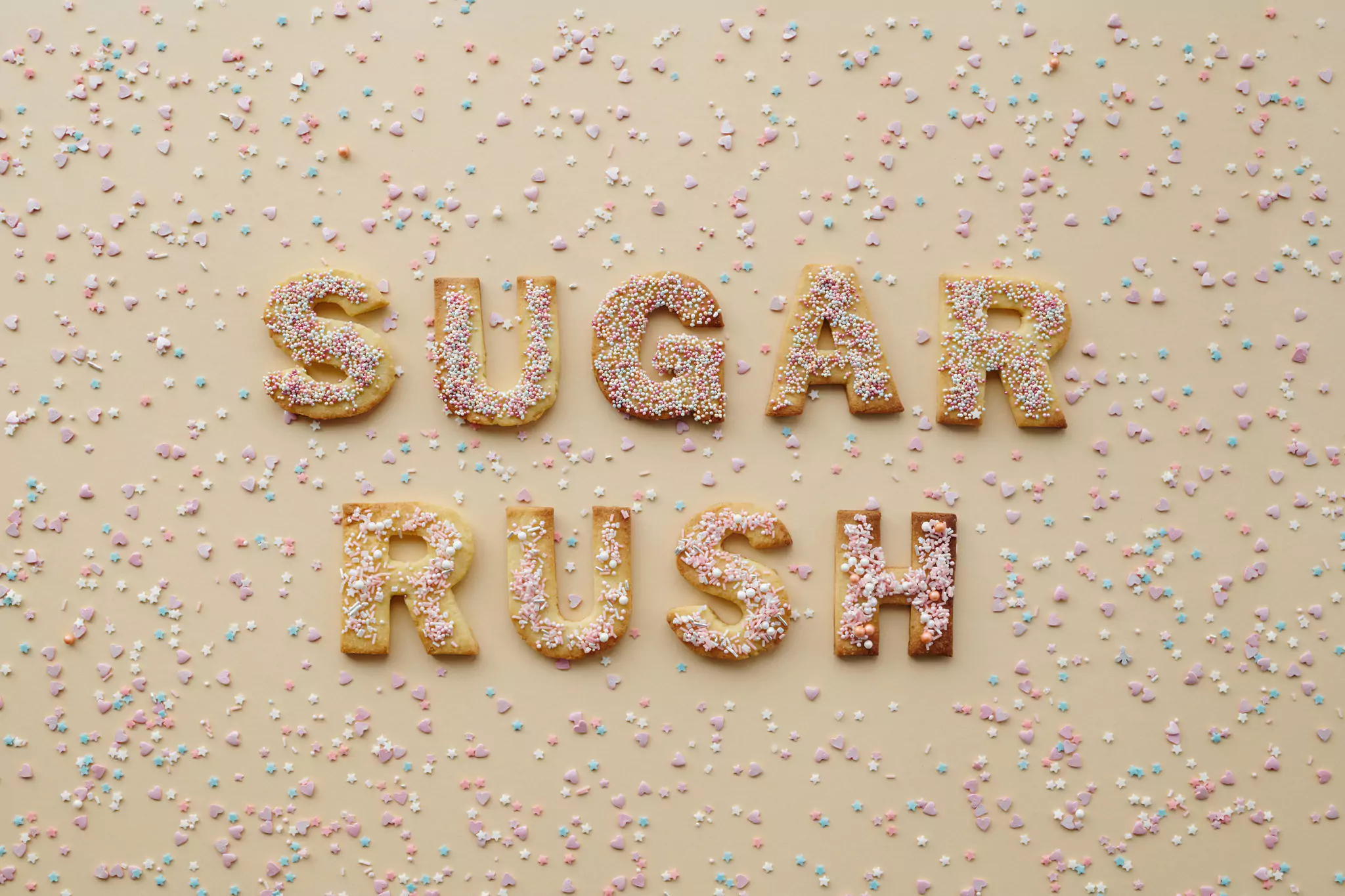 Baked treats that spell out 'Sugar Rush'.